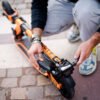 E-TWOW GT Sport electric scooter folded and carried