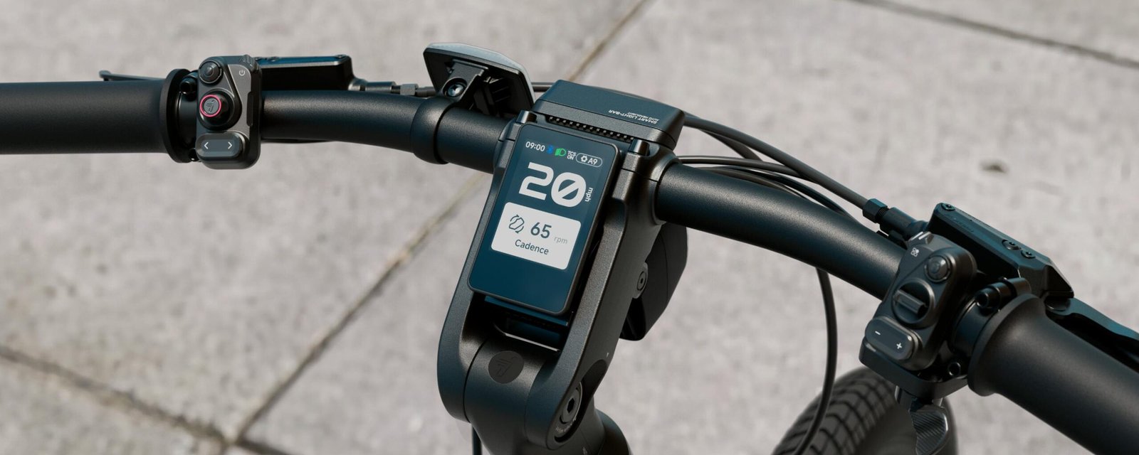 Handlebar display of the Segway Myon electric bike showing 20 mph