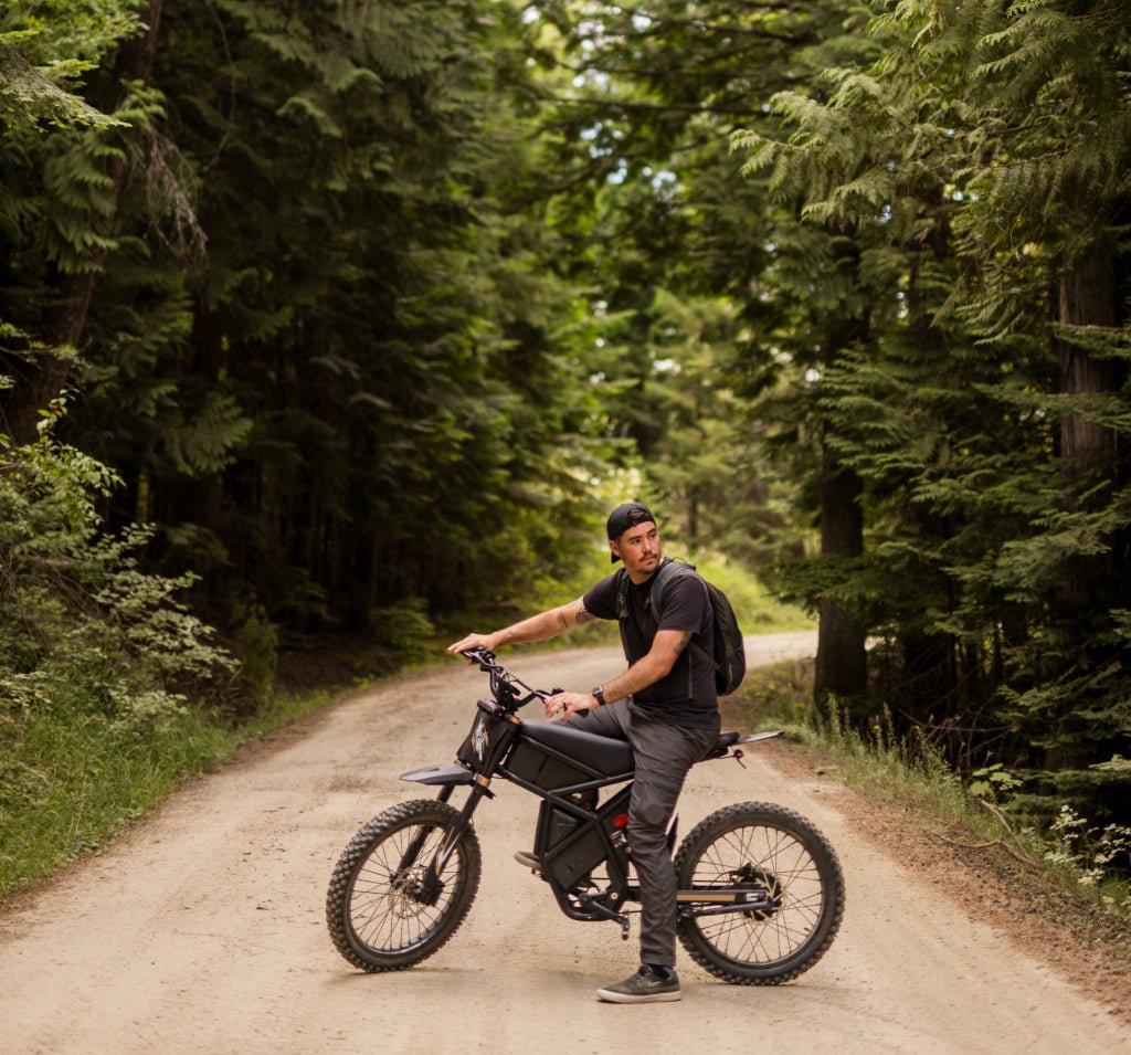 Rider seated on the Riding’times GT73 Pro on a forest track