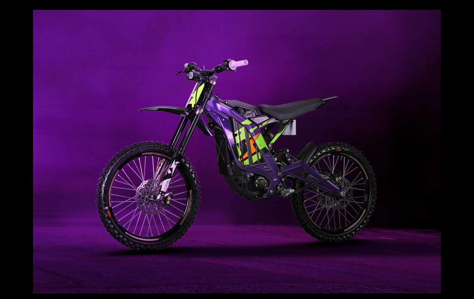 Surron Light Bee X electric dirt bike in Phantom Purple under studio light