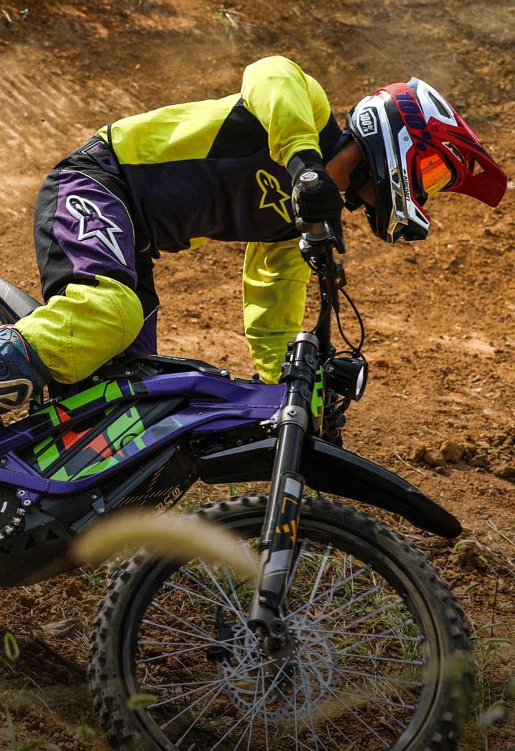 Surron Light Bee X electric dirt bike front fork on the trail