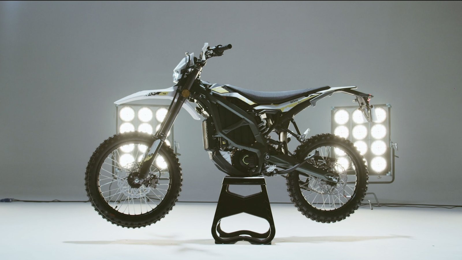 Surron Ultra Bee electric dirt bike ridden hard through rough terrain