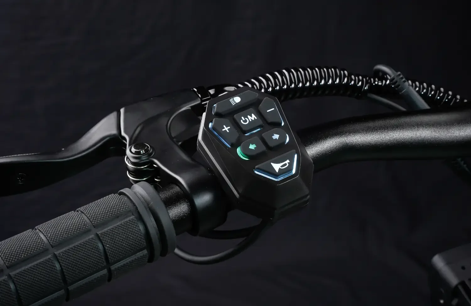 Illuminated multi-function switch on the Teverun Blade Mini Pro electric scooter