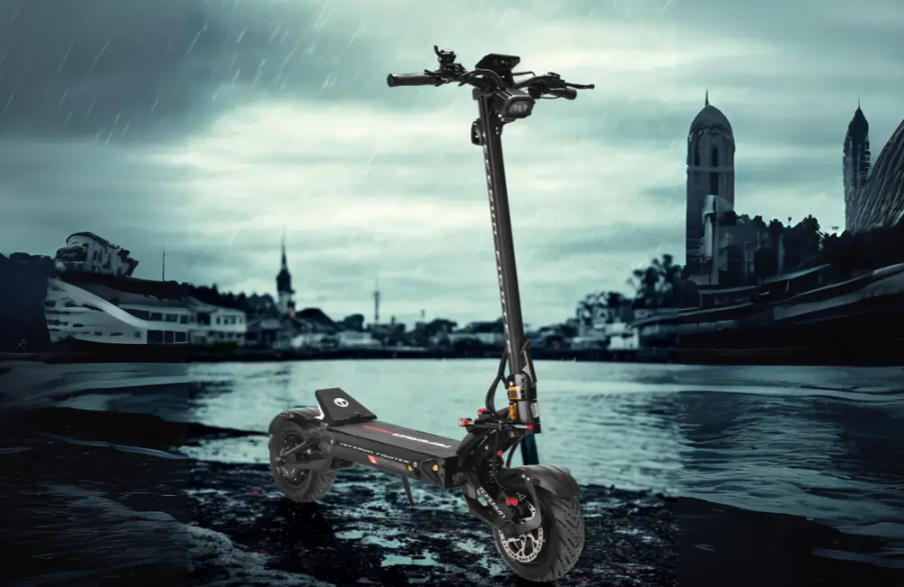 Teverun Fighter Eleven+ electric scooter on a harbour front in the rain