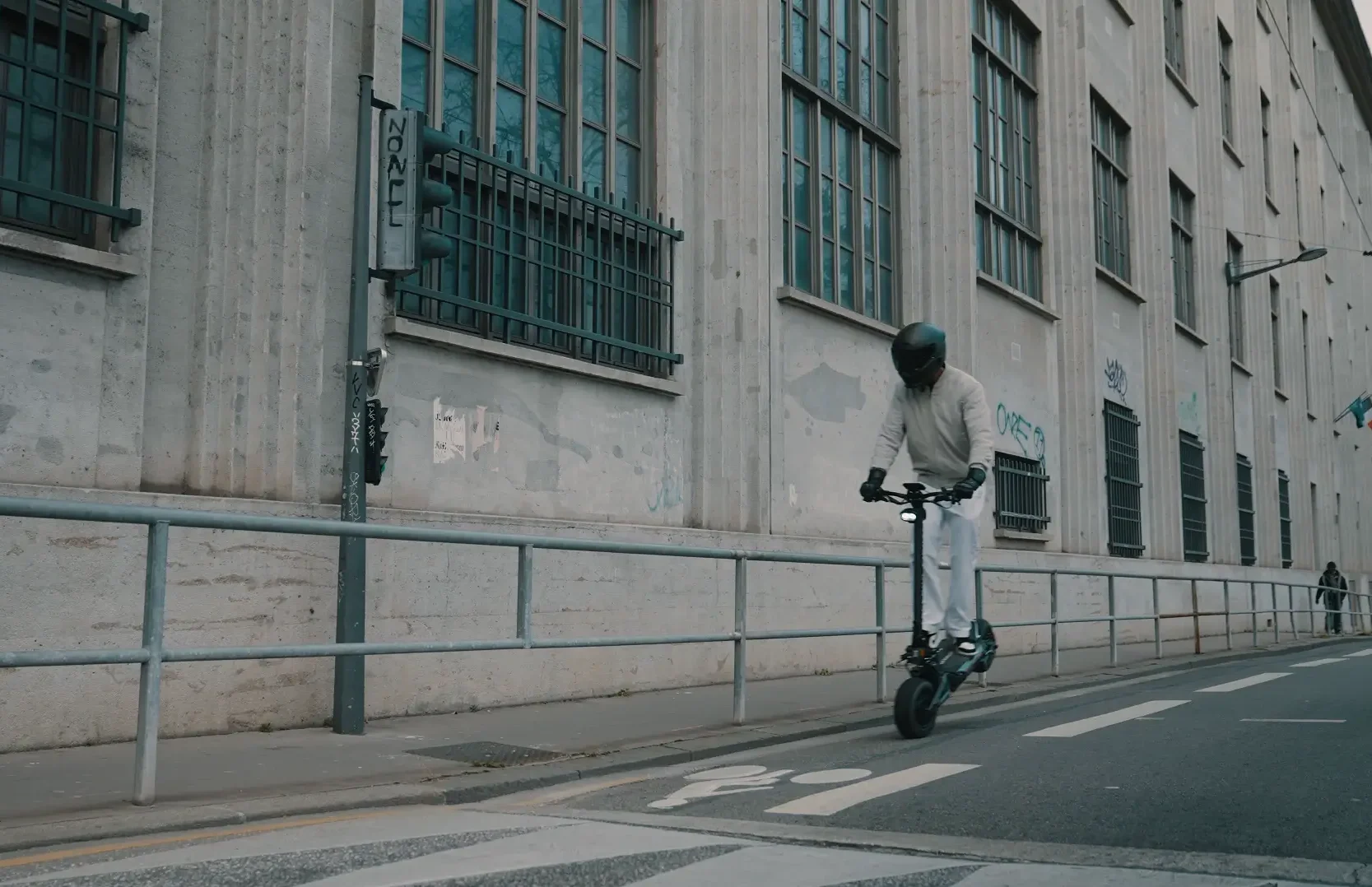 Rider on the Teverun Fighter Supreme 7260R electric scooter on a city street
