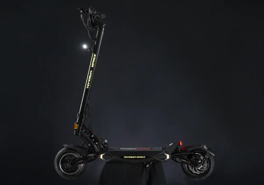 Teverun Space Lite electric scooter side view with lights on