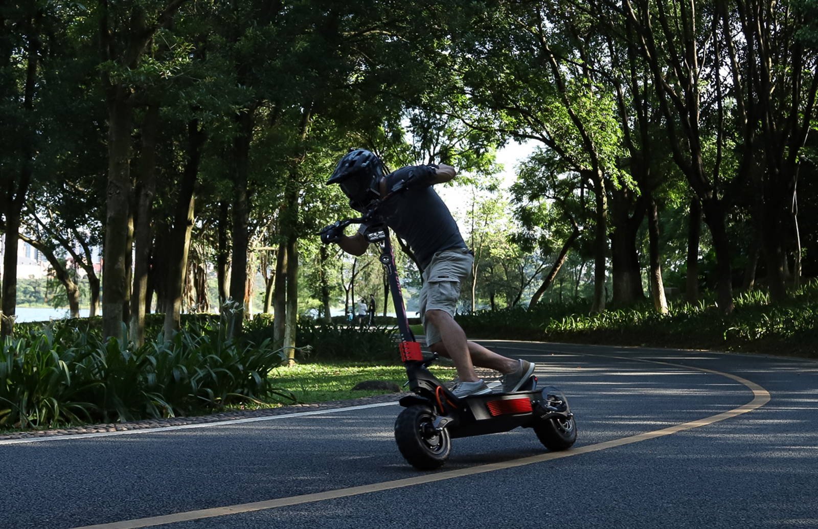 YUME Predator electric scooter rider on a trail