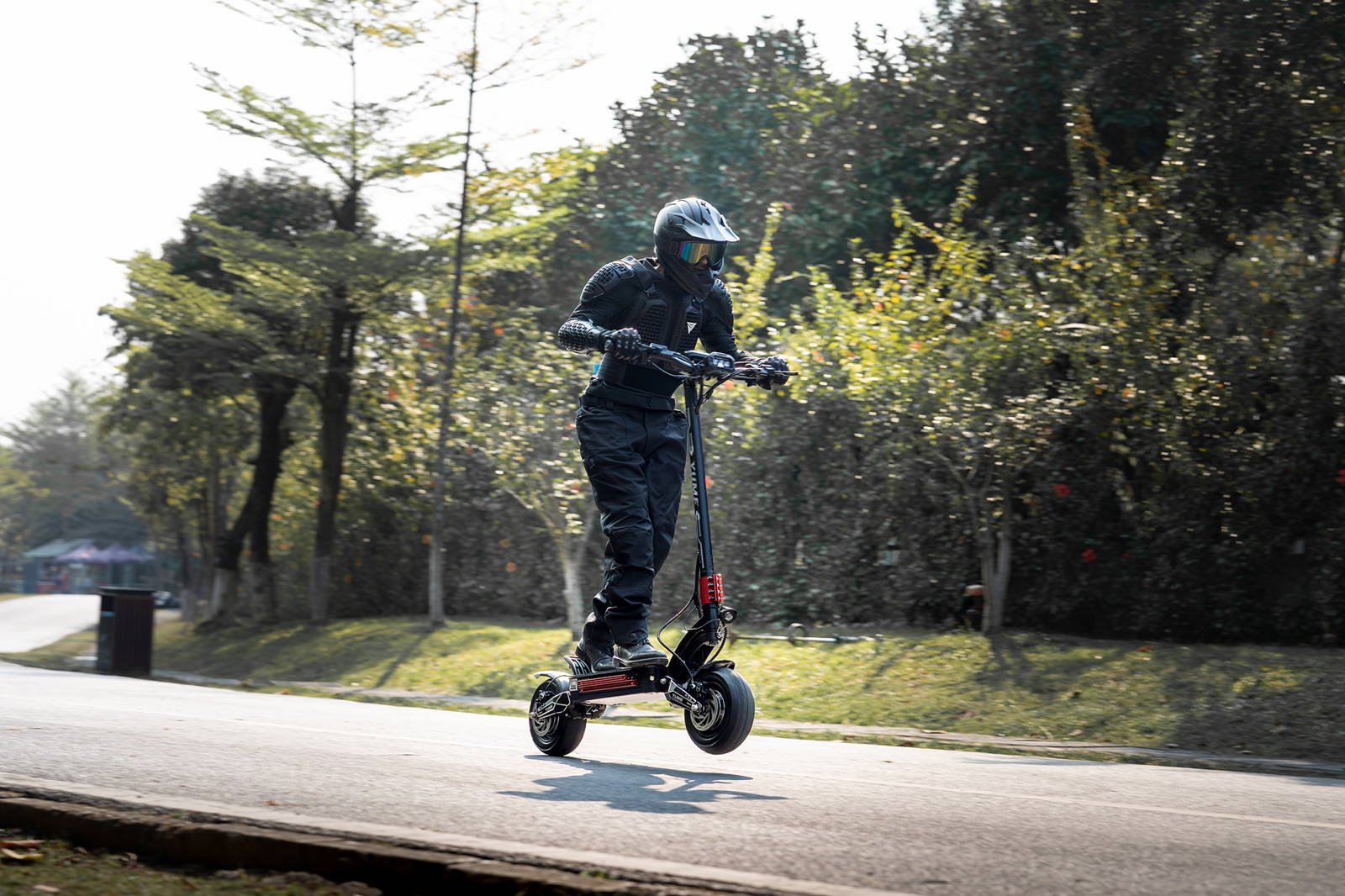 YUME Raptor electric scooter parked on a city street